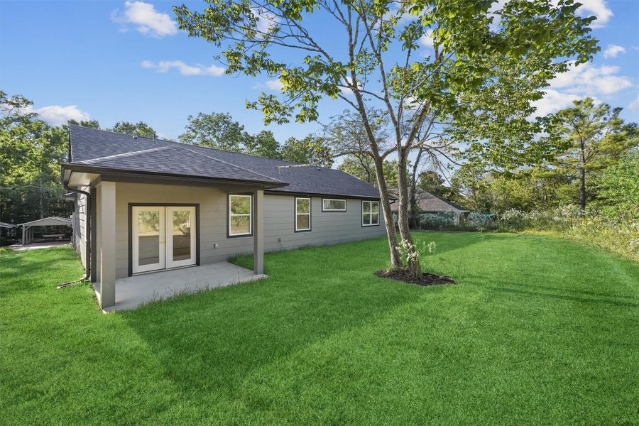 Exterior details and patio area of a home in , Coldspring (Image 1). Exterior details and patio area of a home in , Coldspring (Image 1).