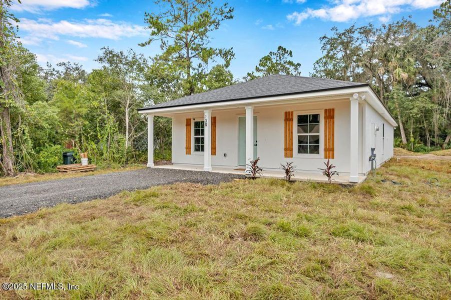 Front exterior of a new home in , East Palatka, FL, highlighting curb appeal (Image 23). Front exterior of a new home in , East Palatka, FL, highlighting curb appeal (Image 23).