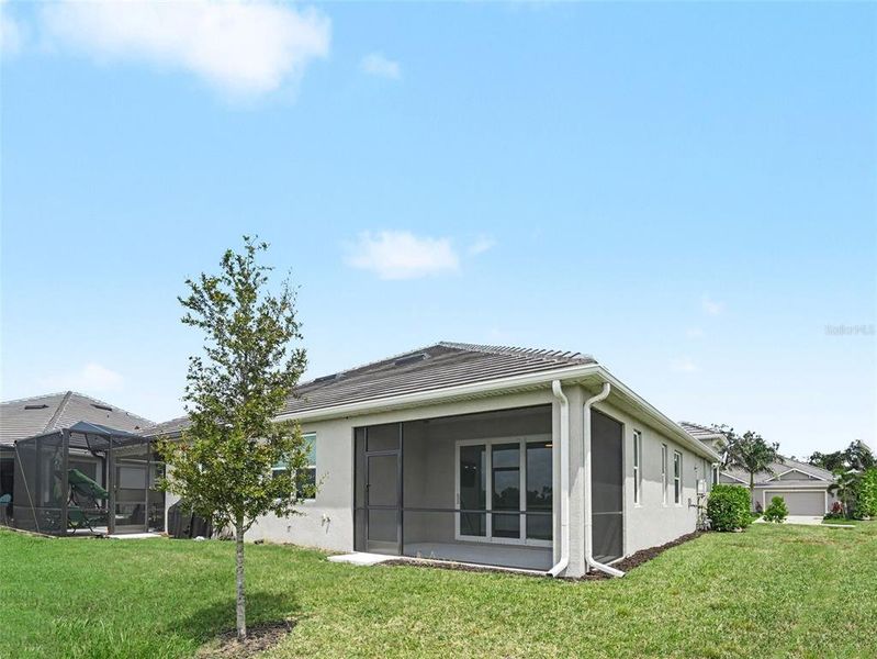 Exterior details and patio area of a home in , Parrish (Image 3).