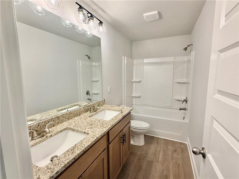 Furnished interior view inside a new home in , Gray (Image 13).