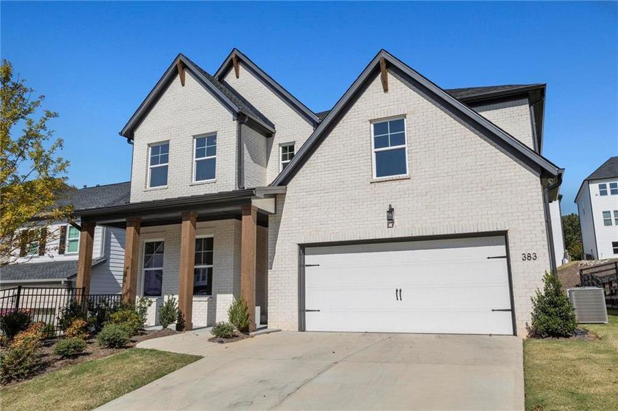 Front exterior of a new home in , Woodstock, GA, highlighting curb appeal (Image 2). Front exterior of a new home in , Woodstock, GA, highlighting curb appeal (Image 2).