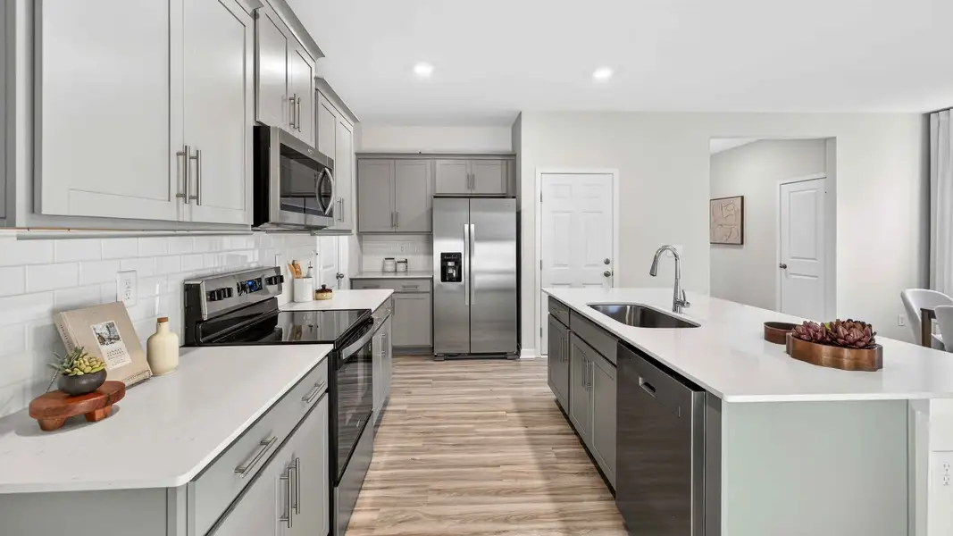 Furnished interior view inside a new home in The Falls at Newton, Newton (Image 3).