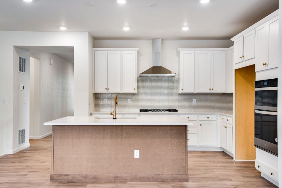 Furnished interior view inside a new home in Ensemble at The Aurora Highlands, Aurora (Image 6).