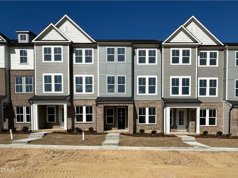 In-progress construction of a new home in Forestville Yard Townhomes, Knightdale, NC (Image 8).