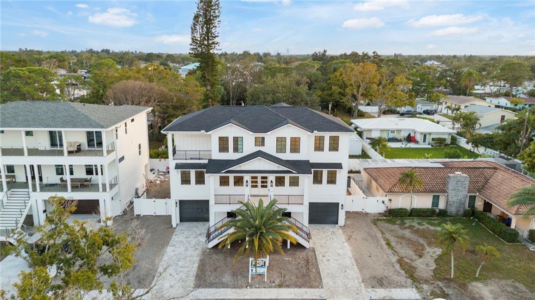 Front exterior of a new home in , St. Petersburg, FL, highlighting curb appeal (Image 1). Front exterior of a new home in , St. Petersburg, FL, highlighting curb appeal (Image 1).