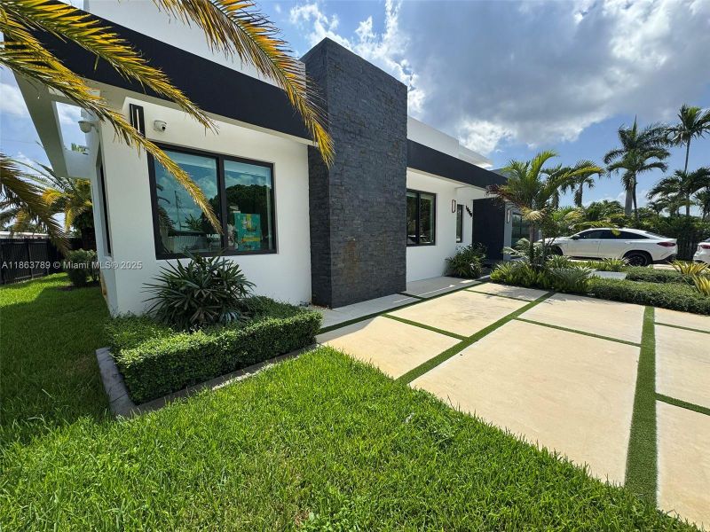 Front exterior of a new home in , Miami, FL, highlighting curb appeal (Image 28).