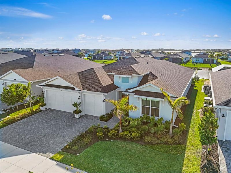 Front exterior of a new home in , Punta Gorda, FL, highlighting curb appeal (Image 21).