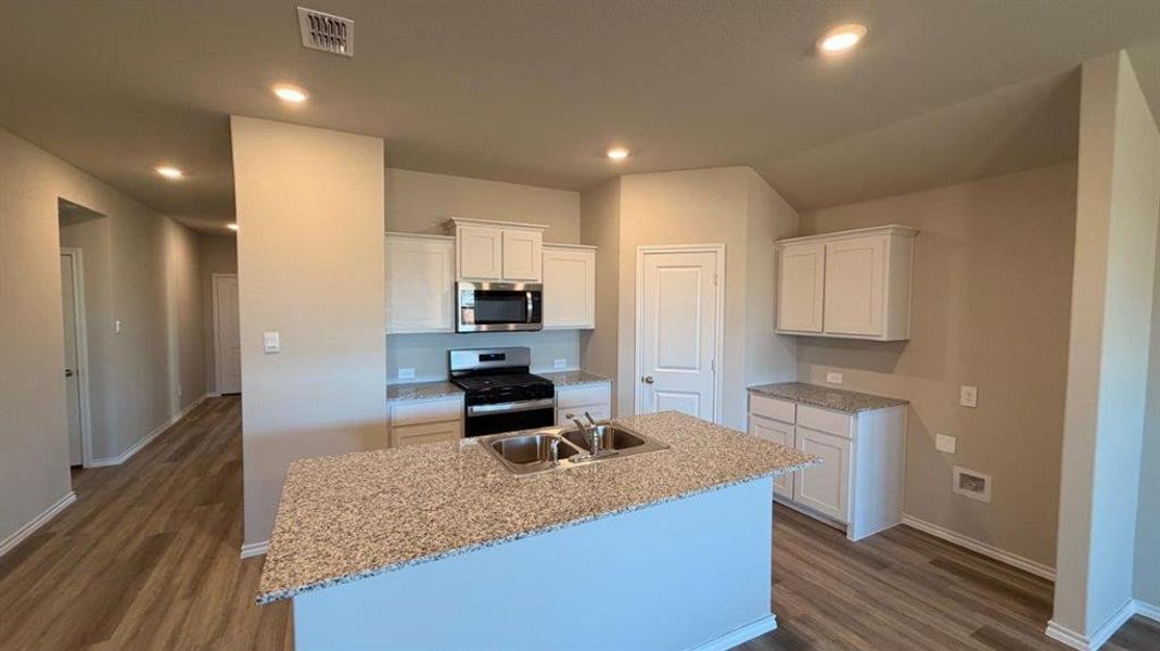 Kitchen- All Home and community information, including pricing, included features, terms, availability and amenities, are subject to change at any time without notice or obligation. All Drawings, pictures, photographs, video, square footages, floor plans, elevations, features, colors and sizes are approximate for illustration purposes only and will vary from the homes as built. Kitchen- All Home and community information, including pricing, included features, terms, availability and amenities, are subject to change at any time without notice or obligation. All Drawings, pictures, photographs, video, square footages, floor plans, elevations, features, colors and sizes are approximate for illustration purposes only and will vary from the homes as built.