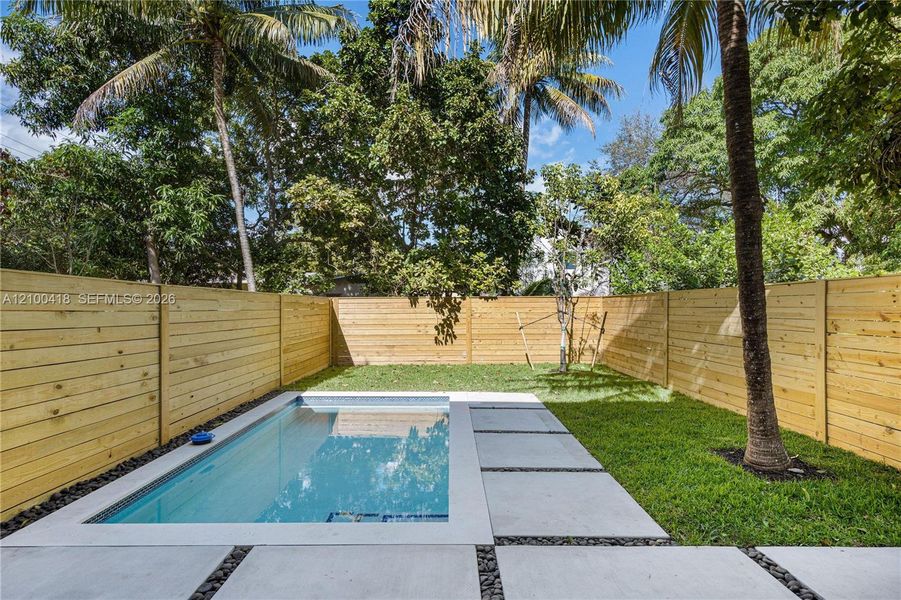 Exterior details and patio area of a home in , Miami (Image 4).