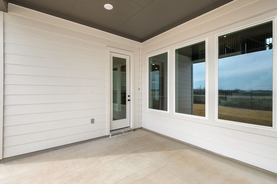 Exterior details and patio area of a home in Lagos Reserve, Manor (Image 23). Exterior details and patio area of a home in Lagos Reserve, Manor (Image 23).