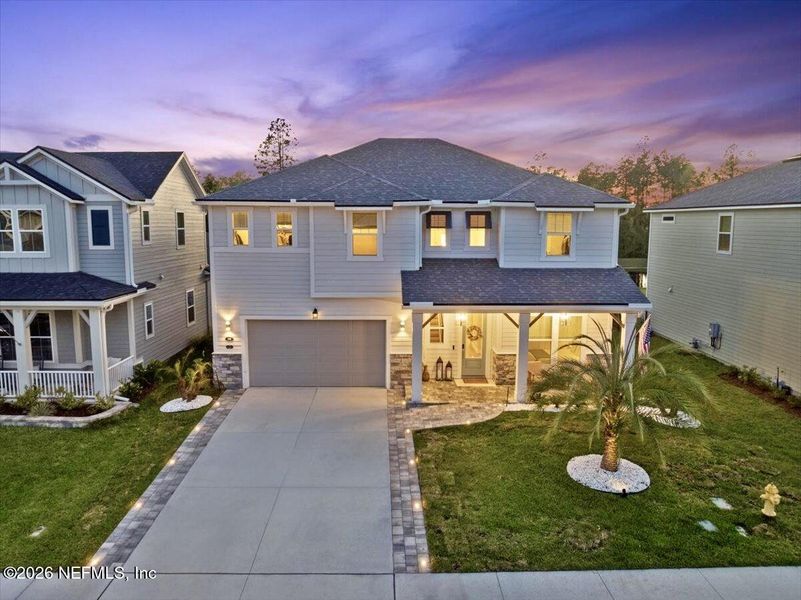 Front exterior of a new home in , St. Johns, FL, highlighting curb appeal (Image 25).
