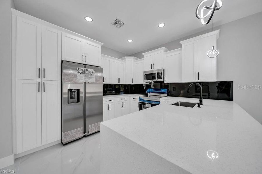 Furnished interior view inside a new home in , Lehigh Acres (Image 9).