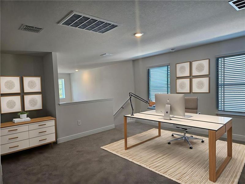 Furnished interior view inside a new home in The Reserve at Hammock Oaks - Classic Series, Lady Lake (Image 12).