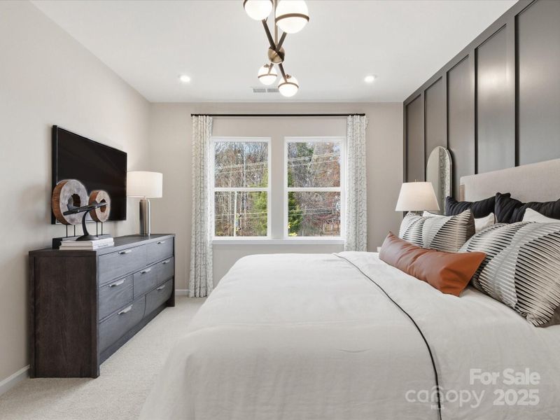 9' Ceilings and 8' Doorways at Primary Suite. *Model Photos | Actual Finishes, Structural Selections, and Orientation May Vary.