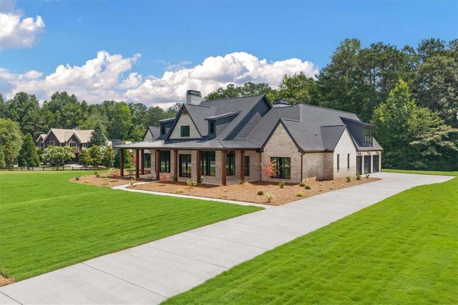 Front exterior of a new home in , Carrollton, GA, highlighting curb appeal (Image 33).