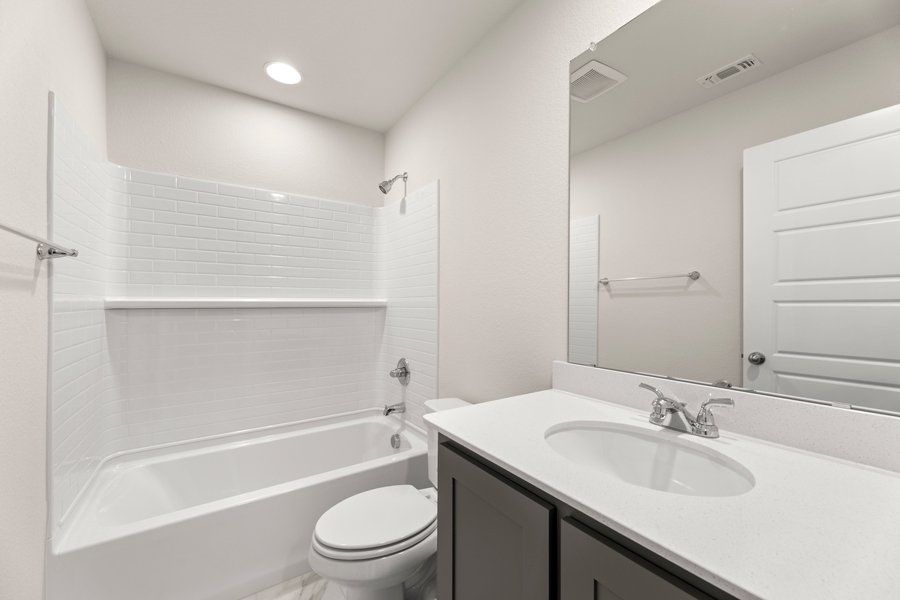 Front exterior of a new home in Sanger Circle, Sanger, TX, highlighting curb appeal (Image 25).