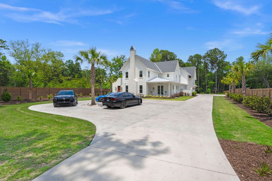 Front exterior of a new home in , Johns Island, SC, highlighting curb appeal (Image 29).