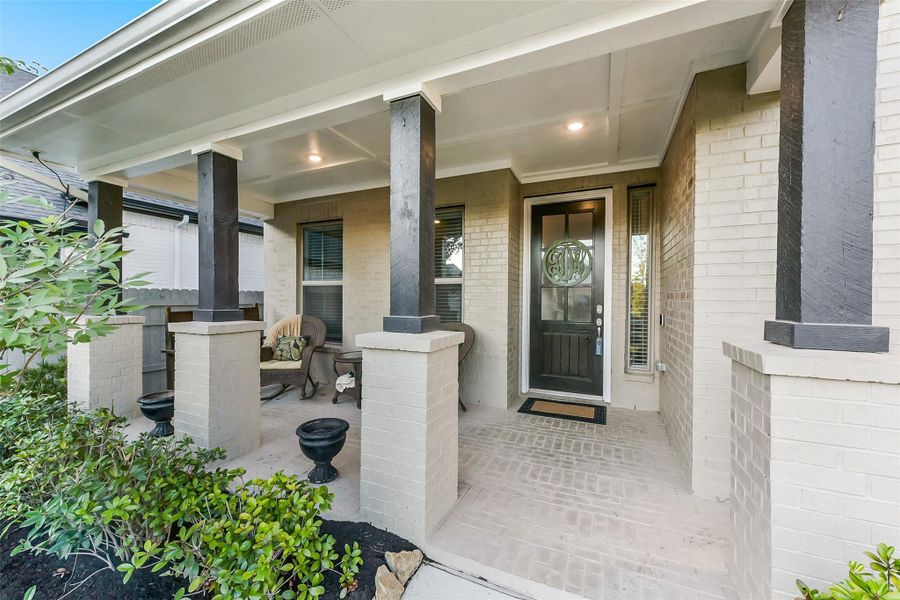 Exterior details and patio area of a home in ARTAVIA 65', Conroe (Image 23).