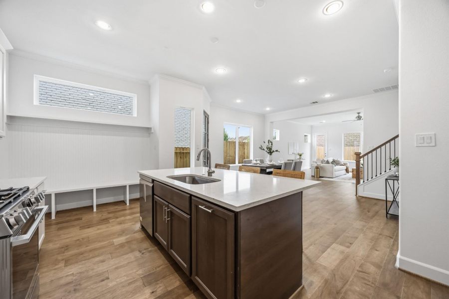 Entertainer's Delight: Seamless flow from kitchen to dining to living space ensures every gathering is unforgettable. Style meets practicality with expansive storage solutions and sophisticated design.