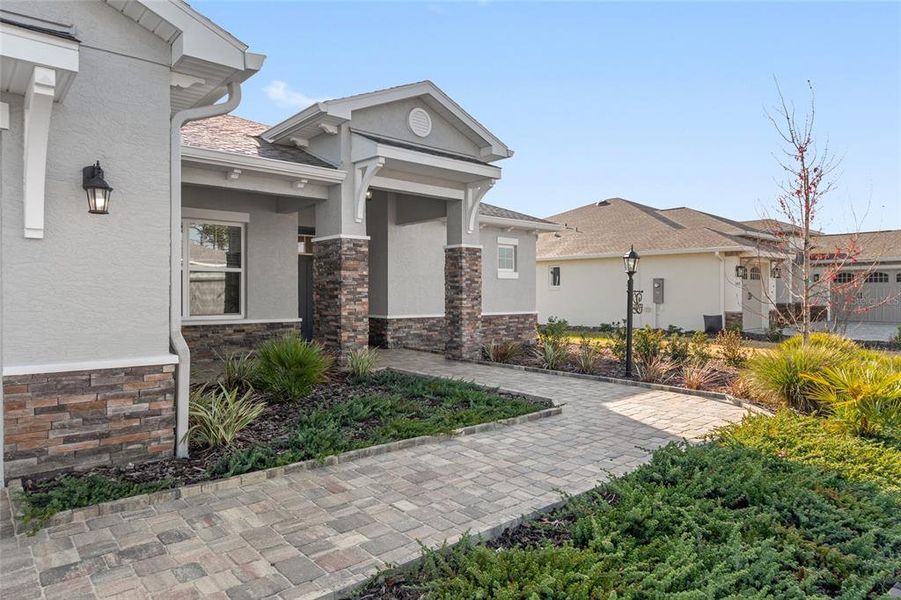 Front exterior of a new home in , Ocala, FL, highlighting curb appeal (Image 2).