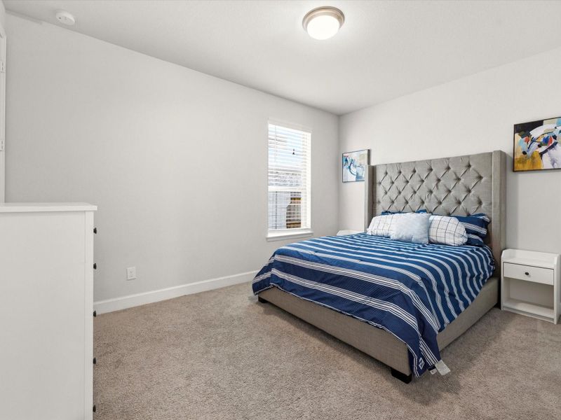 First floor guest bedroom with its own ensuite bath as well.