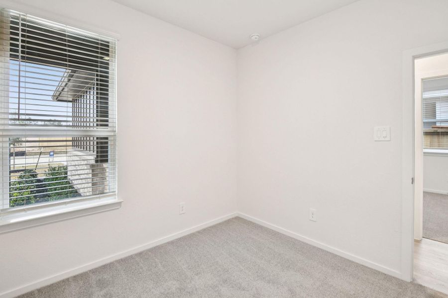 Spacious, unfurnished interior of a new home in Riviera Pines - Traditional Series, Huffman (Image 20).