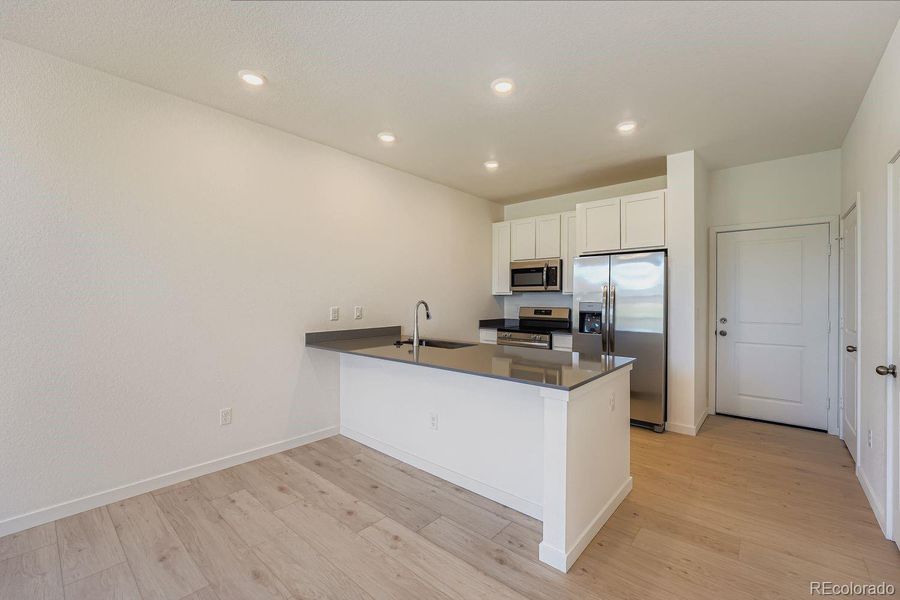 Furnished interior view inside a new home in , Watkins (Image 3).