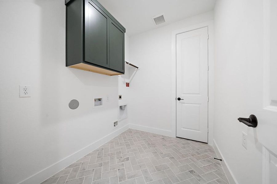 Representative furnished interior of a home built from the Cardinal by Caldwell Homes in Chambers Creek, Willis (Image 12).