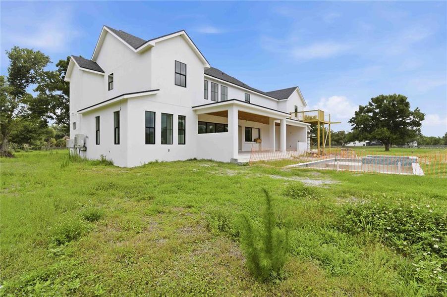 Exterior details and patio area of a home in , Sarasota (Image 12).