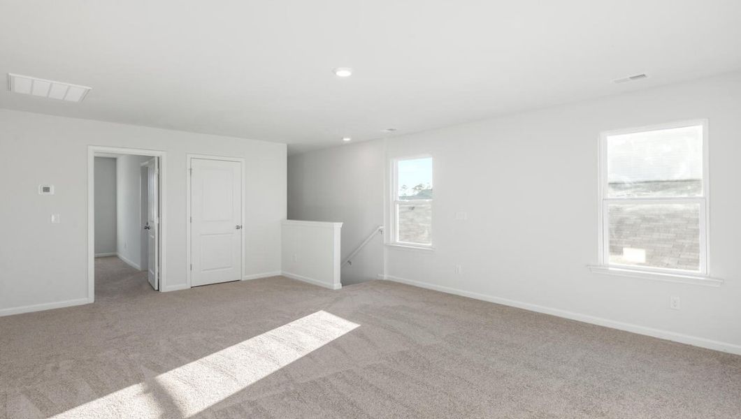 Spacious, unfurnished interior of a new home in The Pines at Blake Farm, Wilmington (Image 16).