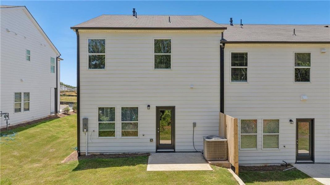 Front exterior of a new home in , Conyers, GA, highlighting curb appeal (Image 21).
