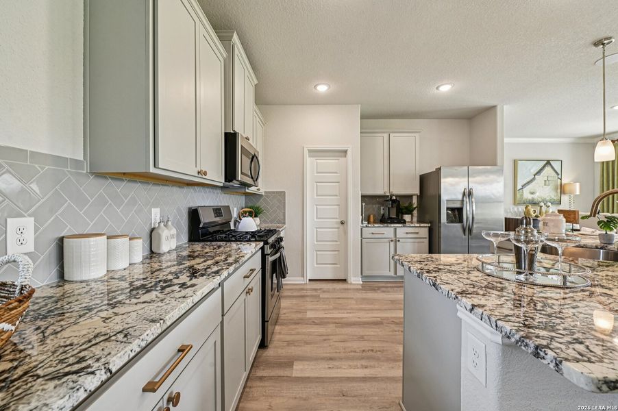 Furnished interior view inside a new home in Villas Las Flores, Floresville (Image 20).