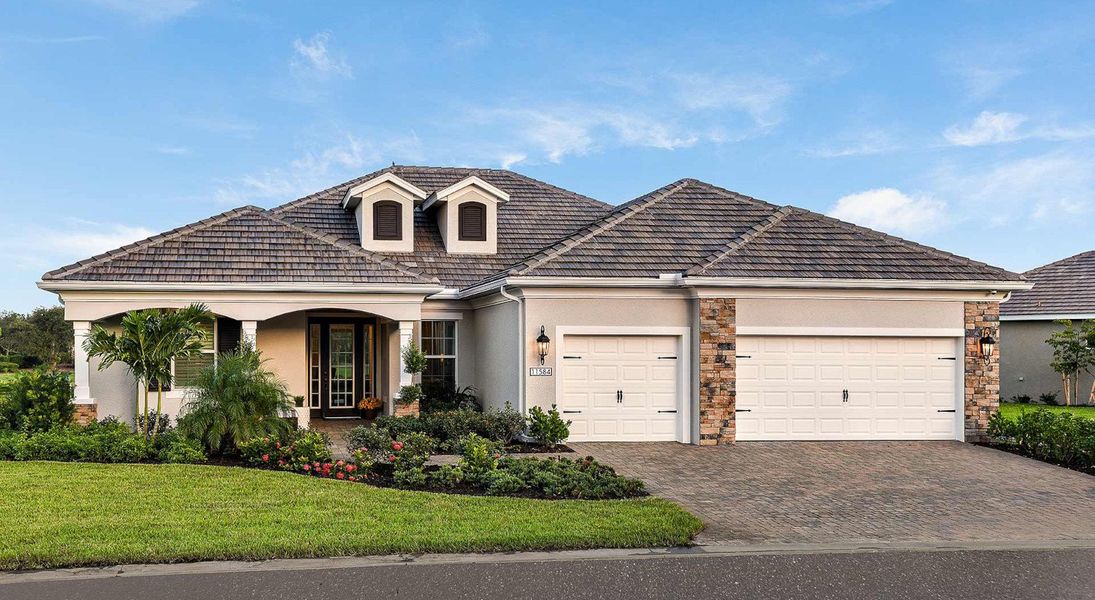 Representative exterior photo of a completed home built from the Captiva by Neal Communities in Verandah, Fort Myers, FL (Image 2). Representative exterior photo of a completed home built from the Captiva by Neal Communities in Verandah, Fort Myers, FL (Image 2).