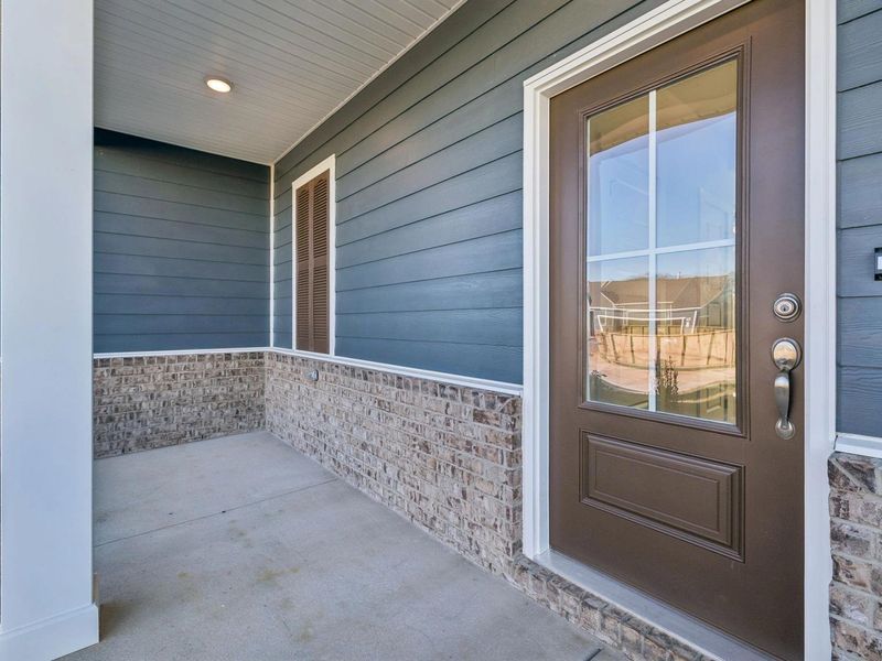 Exterior details and patio area of a home in Sage Farms, White House (Image 4).
