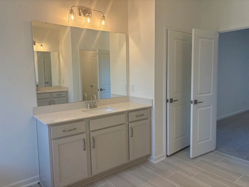 Primary Bath featuring the AW Collection® Milan - Clean geometry and high-contrast finishes.