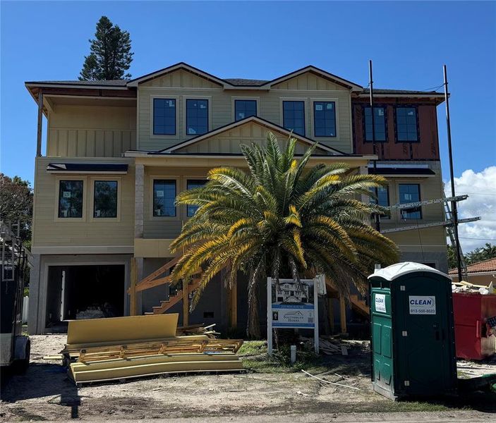 Front exterior of a new home in , St. Petersburg, FL, highlighting curb appeal (Image 13).