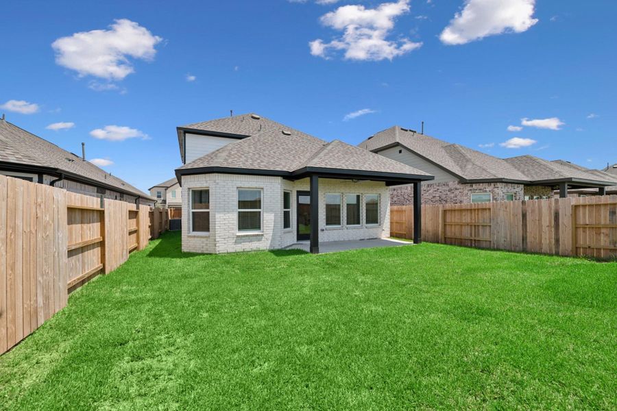 Front exterior of a new home in Marvida, Cypress, TX, highlighting curb appeal (Image 2).