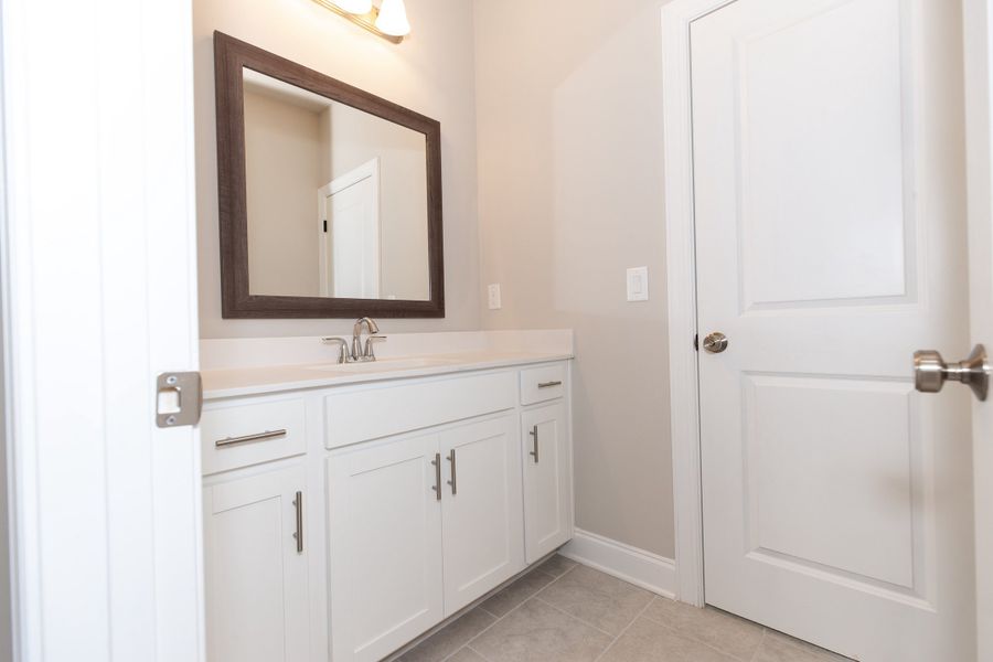 Representative furnished interior of a home built from the The Charleston by The Providence Group in Aberdeen, Hoschton (Image 18).