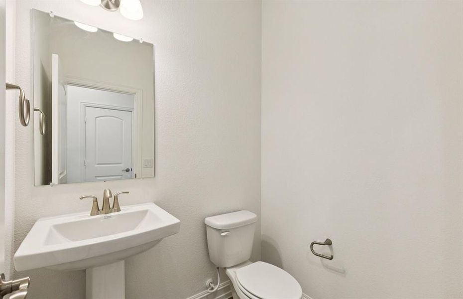 Powder room with elegant finishes *Real home pictured Powder room with elegant finishes *Real home pictured