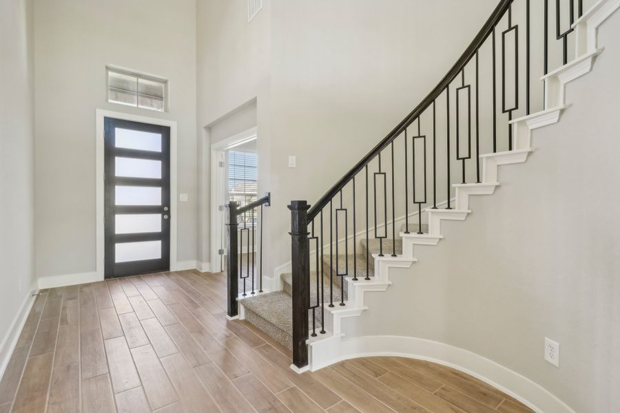 Entry and staircase in the Cedar floorplan at a Meritage Homes community.