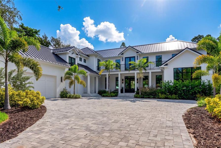 Front exterior of a new home in , Sarasota, FL, highlighting curb appeal (Image 2). Front exterior of a new home in , Sarasota, FL, highlighting curb appeal (Image 2).