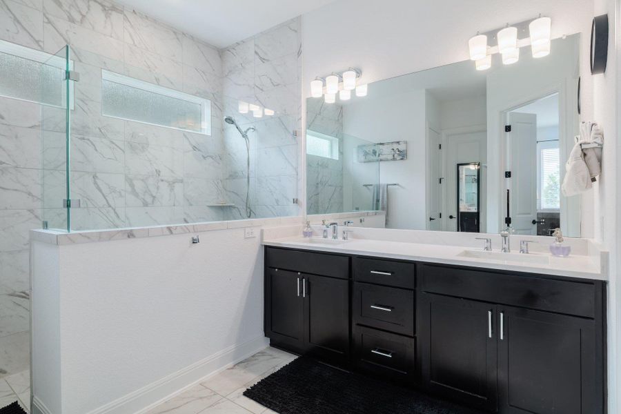 Primary bath with huge walk-in shower. Primary bath with huge walk-in shower.