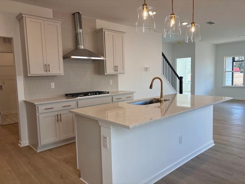 Kitchen featuring the AW Collection® Serene - Clean lines and earthy textures define the space.