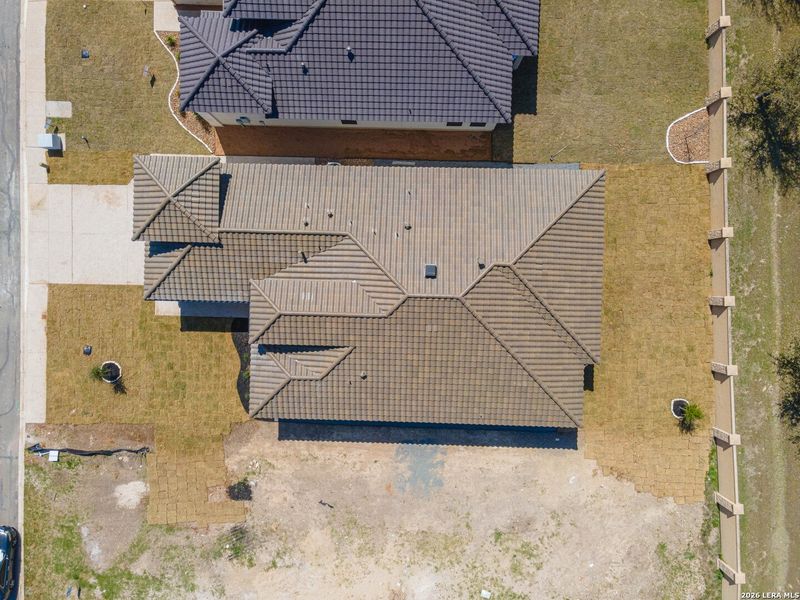Exterior details and patio area of a home in , Kerrville (Image 20).