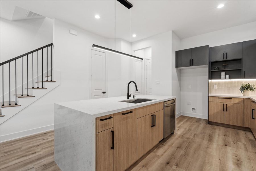 Architectural clarity shinesthrough the open stair railingsand clean sightlines, connectingeach level in one cohesivedesign language.