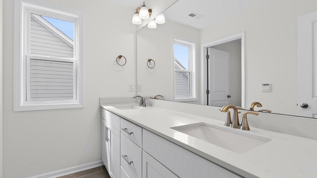 Furnished interior view inside a new home in The Grove at Winston Pointe, Clayton (Image 8).