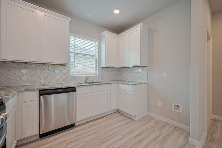 Furnished interior view inside a new home in Sunterra, Katy (Image 6).