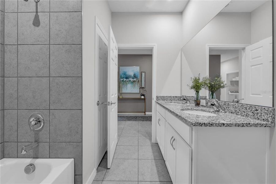 Furnished interior view inside a new home in Covered Bridge at Liberty Bluff, Haines City (Image 9). Furnished interior view inside a new home in Covered Bridge at Liberty Bluff, Haines City (Image 9).