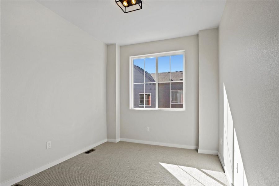 Spacious, unfurnished interior of a new home in Arras Park, Thornton (Image 17).