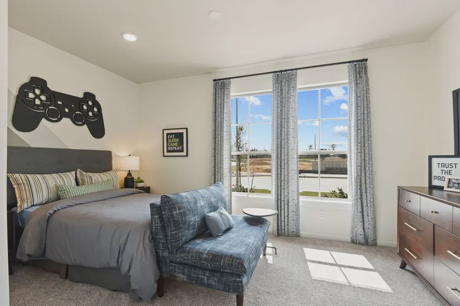 Representative furnished interior of a home built from the Springfield by Chesmar Homes in Balmoral, Humble (Image 5).